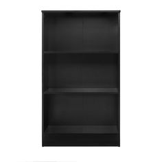 a black bookcase with three shelves on the bottom and one shelf below it, in front of a white background