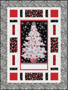 a quilted christmas tree with red, white and black trimmings on it