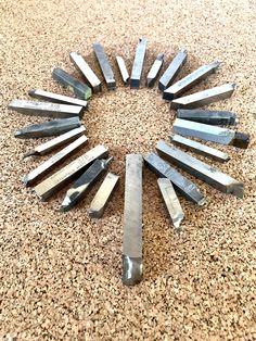 there are many different tools arranged in the shape of a circle on the floor,