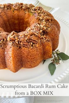 a close up of a bundt cake on a plate with the words, scrumptious bacardi rum cake from a box mix