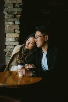 Simple engagement couple photos at a local coffee shop and cafe. Couple looking outside from the window Couple Photography Poses In Cafe, Couple Shoot In Cafe, Couple Drinking Coffee Aesthetic, Coffee Prenup Ideas, Cafe Couple Photoshoot Ideas, Cafe Pre Wedding Shoot, Cafe Prewedding Photo Shoot, Couple Poses In Cafe, Couple In Cafe Aesthetic