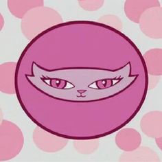 an image of a cat with big eyes in the middle of a pink circle on polka dot background