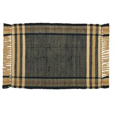 a black and tan rug with fringes on it's edges, against a white background