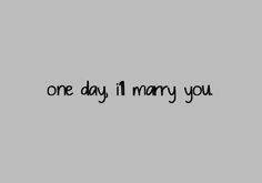 the words one day i'll marry you are written in black on a gray background