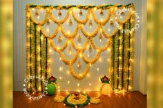 the backdrop is decorated with flowers and lights