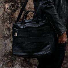 Made for men and women, our Executive Leather Laptop Bag is all about upgrading your work look .High Quality Bags with maximum functionality and minimal design to carry your laptop, files ,documents in a minimal possible way.Features ﻿ Crafted with 100% genuine Cow leather Laptop Compartment Size: Upto 15.5 inch Removable, adjustable padded shoulder strap Rear smart zipper allows you to attach this bag to the extended handles of rolling cases Main compartment has two large sections with one pock Laptops And Tablets, Leather Laptop Bag, Bag Stand, Leather Laptop, Work Looks, Tablet Laptop, Minimal Design, Laptop Bag, Cow Leather