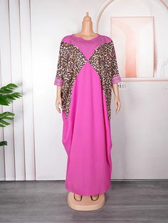 Elevate your fashion style with our luxurious Maxi Dress. Elegant Oversized V-neck Maxi Dress, Pink Non-stretch Evening Dress, Trendy Chiffon Party Dress, Casual Shift Maxi Dress For Party, Long Sleeve Shift Maxi Dress, Long Sleeve Chiffon Kaftan For Spring, Chic Non-stretch Chiffon Dress, Elegant Oversized Dresses For Vacation, Trendy Pink Flowy Dress