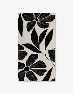 a black and white flower pattern on a napkin