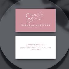 a business card with a woman's breast on it and the words, massage therapy