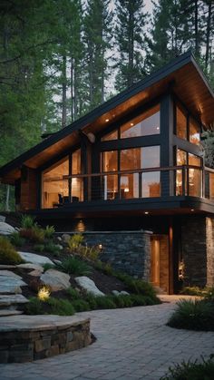 a modern house in the woods at night