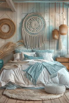 a bedroom with blue and white decor on the walls, bedding and pillows in different colors