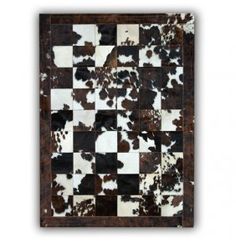 a piece of art that looks like a checkerboard pattern with brown and white squares