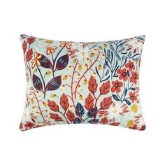 a blue and red floral pillow on a white background