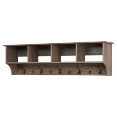 a wooden shelf with hooks on it