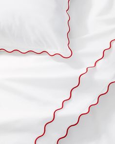 the white sheets have red stitchs on them