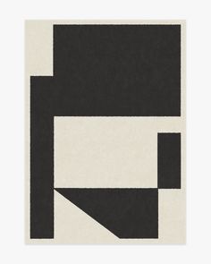 a black and white rug with an abstract design