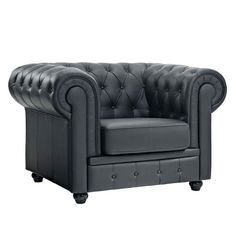 a black leather chair with buttons on the armrests and footstools is shown in front of a white background