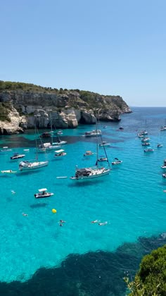 many boats are in the clear blue water