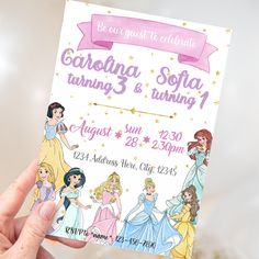 a hand holding up a birthday card with princesses on it and the words, california sofa turning 3 & turning 1