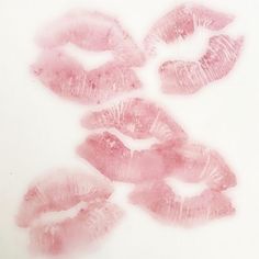 some pink lips on a white background