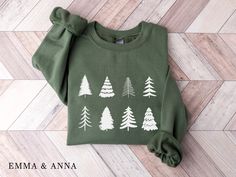 Christmas Tree Sweatshirt *Product Details - Unisex Sweatshirt - Designed with pre-shrunk soft air-jet spun yarn - Features a crew neck - Double-needle stitched collar, shoulders, armholes, cuffs and hem - Loose fit for a comfortable feel *Sizing and Colors - Please refer to sizing and color charts in the images *Fabrication - 50% cotton, 50% polyester *Care Instructions - Turn inside out and machine wash cold on delicate cycle - Dry on low heat setting - Do not bleach - Do not dry clean - Do no Minimal Sweatshirt, Holiday Sweaters, Tree Sweater, Merry Bright Christmas, Christmas Tree Shirt, Winter Shirts, Christmas Outfits, Holiday Sweatshirt, Tree Shirt