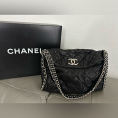 This Rare Classic Authentic Chanel Hobo Bag Is An Absolute Must-Have. I Have Only Used It A Few Times And Received A Ton Of Compliments. Priced To Sell. Same Style Bags Are Currently Selling For $7k+. Exact Bag Is Selling For Almost $4k On Here From Other Sellers In Worse Condition. Features: -Crafted From Luxurious Black Washed Lambskin Leather, This Bag Features A Chain Around The Handles In Silver Color That Adds A Touch Of Elegance And Sophistication To The Design. -The Top Has A Magnetic Cl Chanel Hobo Bag, Big Clutch, Chanel Chain, Hobo Style, Same Style, Leather Hobo, Quilted Leather, Flap Bag, Lambskin Leather