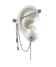 Don't let your piercing go unnoticed! You can choose a 14 or 16 gauge size for the bars. The gauge refers to the diameter of the bars You can choose a long industrial barbell or 2 short piercing bars you can wear the bars without the chains My store https://www.etsy.com/ca/shop/triballook Guy With Industrial Piercing, Bar Through Ear Piercing, Gothic Industrial Piercing, Goth Industrial Piercing, Cyberpunk Piercing, Small Industrial Piercing, Unique Industrial Piercing Jewelry, Ear Piercings Bar, Cool Industrial Piercing