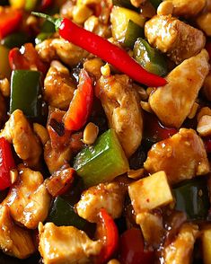 chicken and peppers are mixed together in a stir fry