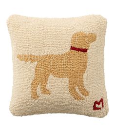 a pillow with a dog on it