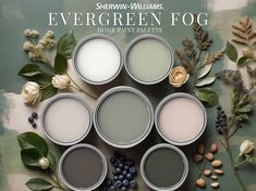 several paint cans with flowers and leaves around them on a green background that says evergreen fog home paint palette