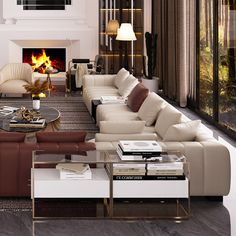 a living room filled with furniture and a fire place in the middle of the room