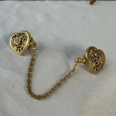 Goldtone Heart Filigree Style Sweater Guard See Pictures For Details And Approximate Measurements This Looks To Be A Never Worn Piece But Some Unnoticeable Scuffs At Inside Of Clip Ask Any Questions Bundle For Extra Savings Happy Poshing B100 Luxury Heart-shaped Clip-on Jewelry, Vintage Gold Clip-on Earrings As Gift, Ornate Gold Clip-on Jewelry, Antique Yellow Gold Clip-on Jewelry, Vintage Gold Filigree Clip-on Earrings, Sweater Guard, Vintage Sweater Clips, Cardigan Clips, Sweater Clips