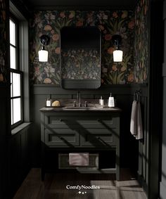 a bathroom with floral wallpaper and dark wood flooring, along with two sinks