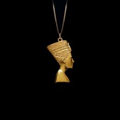 Elevate your style with our 14k Gold Nefertiti Pendant. This solid gold necklace showcases exquisite craftsmanship, symbolizing the beauty and royalty of ancient Egypt. The 14 karat gold Nefertiti pendant is more than just jewelry; it's a fine representation of historical elegance and the allure of Egyptian culture, also available in 18k yellow gold. PENDANT INFORMATIONThis pendant is made of real, solid gold.• Made in USA• Material: 14k or 18k solid gold• Finish: polished• Height: 1.2" (30 mm) Egypt Necklace, Egyptian Pendant, Nefertiti Pendant, Ancient Egypt Jewelry Tutankhamun, Egyptian Queen Nefertiti, Phoenix Pendant, Egyptian Queen, Egyptian Culture, Solid Gold Necklace