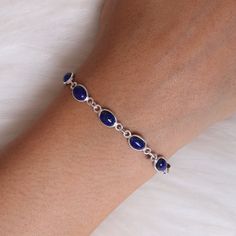 "Lapis Lazuli Bracelet, 925 Solid Sterling Silver Bracelet, Handmade Bracelet, September Birthstone, Women Silver Jewelry, Hippie Bracelet Gemstone Name - Lapis Lazuli Stone Quality - AAA Bracelet Weight - 5.60  gm Stone Length - 0.6 cm  Stone Width - 0.3 cm  Length - 6 inch to 9 inch sizes are available, we give 0.5 inch adjustable in the size which you order ( NOTE - 0.5 INCH ADJUSTABLE IS INCLUDED IN YOUR ORDERED SIZE ) Stone Shape - As shown in the picture You'll get the exact product as sho Silver Bracelets Handmade, Women Jewelry Silver, Elegant Sterling Silver Beaded Bracelets With Stones, Elegant Sterling Silver Beaded Bracelet With Stones, Dainty Sterling Silver Bracelets With Natural Stones, Sapphire Sterling Silver Bracelet, Sapphire Sterling Silver Bracelets Gift, Sapphire Sterling Silver Bracelet Gift, Sapphire Sterling Silver Bracelet For Gift