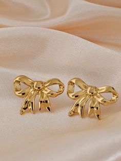 ✧ Gold Bow Earrings - Stainless Steel PVD, Tarnish-Free, Hypoallergenic, Waterproof ✧ Add a whimsical yet elegant touch to your look with these charming gold bow earrings. Crafted from premium stainless steel with a PVD gold coating, they offer a long-lasting shine that resists tarnish. Their playful design is perfect for any occasion, from casual days to formal evenings. ✧ Key Features ✧ * Stainless Steel with PVD Gold Coating: Durable, high-quality material with long-lasting color and shine. * Gold Earrings For Valentine's Day Formal, Gold Earrings For Valentine's Day Formal Occasion, Formal Gold Earrings For Valentine's Day, Gold Plated Earrings For Valentine's Day Formal, Gold Plated Earrings For Valentine's Day Formal Occasions, Gold Clip-on Earrings For Valentine's Day Gift, Gold Earrings For Wedding On Valentine's Day, Valentine's Day Gold Clip-on Jewelry, Gold Wedding Earrings For Valentine's Day