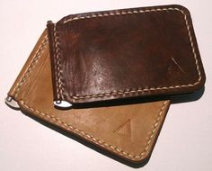 This handmade leather money clip style wallet has 2 individual credit cards slots. You can even put a few more cards in the same slots. Up to 8 cards total. Cash is snapped down by the clip in the middle. Pick your leather colour from the list, then pick your stitching colour from the list. All hand made with premium leather hides and hand saddle stitched. Classic quality leather style. Leatherman Sheath, Trucker Wallet, Pinterest Expert, Simple Wallet, Leather Card Holder Wallet