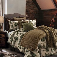 the comforter has pine trees on it