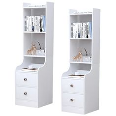 two white bookcases with drawers on each side