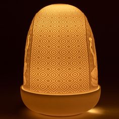 The Lord Ganesha and Goddess Lakshmi Dome Lamp features the hand crafted engraving of two of the most revered deities in India. One side shows Ganesha, the god of wisdom and knowledge. The other side shows Lakshmi, the goddess of fortune and prosperity. This piece has a LED module integrated in the base with a power of 1.3 watts, whose intensity adjustable through the module's touch switch. Features approximately 7 hours of life with a charge time of 4 hours from the included USB cable. After this initial charge, the cable should be removed and it will run on battery power.
Note: This is one lamp. Goddess Of Fortune, God Of Wisdom, Dome Lamp, God's Wisdom, Porcelain Lamp, Touch Switch, Goddess Lakshmi, 7 Hours, Higher Design