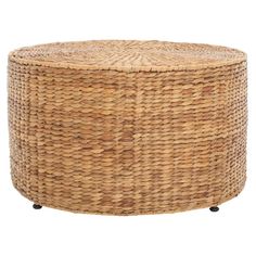 a large round wicker ottoman with wheels