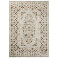 a white rug with red and blue flowers on it