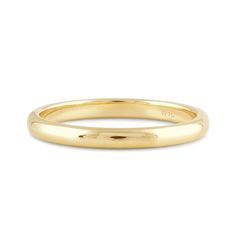 a yellow gold wedding ring with a thin band on the outside, and a plain surface