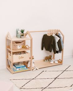 a wooden shelf with clothes and shoes on it