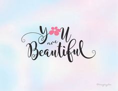 the words you are beautiful written in black ink on a pastel blue and pink background