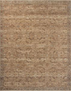 an area rug with brown and beige colors