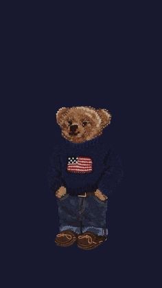 a small teddy bear wearing a sweater and boots with an american flag on it's chest