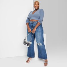 High-rise medium wash baggy jeans from Wild Fable™. Tailored in a boyfriend cut with a relaxed fit and distressed details. Crafted from cotton-blend denim with spandex for stretchy comfort. A belt-loop waistband with a zip fly and button fastening offers a secure fit. Classic front and back pockets complete the functional look. If you're not satisfied with any Target Owned Brand item, return it within one year with a receipt for an exchange or a refund. Wild Fable™: A look for every story. Best Jeans For Fupa, Plus Size Jeans Outfit Casual, Wide Leg Jeans Outfit Plus Size, Plus Size Jeans Outfit, Target Plus Size, Wide Leg Baggy Jeans, Cropped Jeans Outfit, Wide Leg Jeans Outfit, Boyfriend Cut