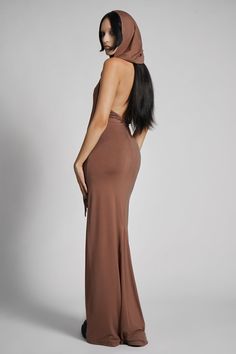 Make them take a second glance. Maxi dress made from luxuriously dense Jersey, featuring an add-on hood that can be draped across the shoulders and over the crown of the head, with plunging halter top neckline. FIT NOTES:Tatianna wears a size Small, 5'9, with a 26" waist.MATERIALS:95% rayon 5% spandexMade in China God Costume, Greek God Costume, Top Neckline, Greek God, Hooded Dress, The Crown, Halter Top, Dress Making, Take That