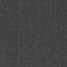 dark grey herring fabric textured upholstered to the surface with an interesting pattern